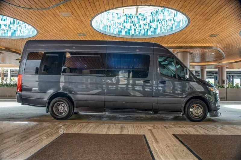 Luxury Sprinter van parked at a Coconut Grove boutique hotel during a 5-day consulting firm client visit