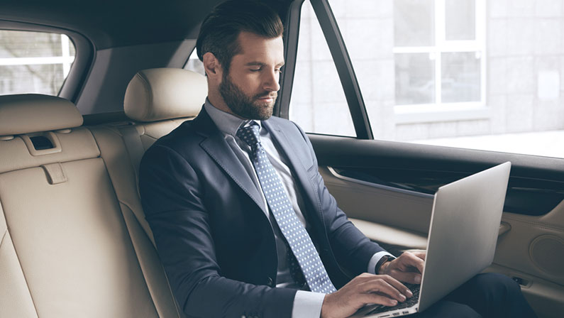 Young business man using a corporate transportation services in Florida