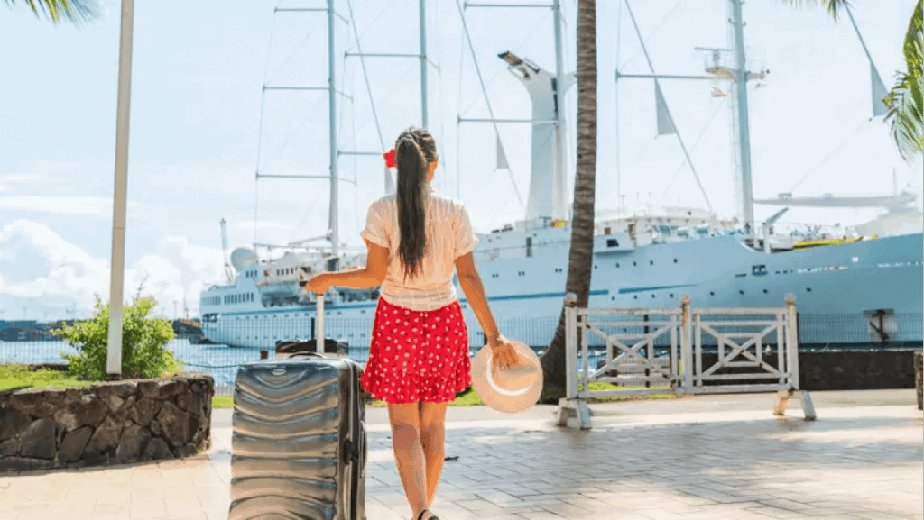 Woman with suitcase heading to cruise ship after luxury transfer from Miami airport to cruise port.