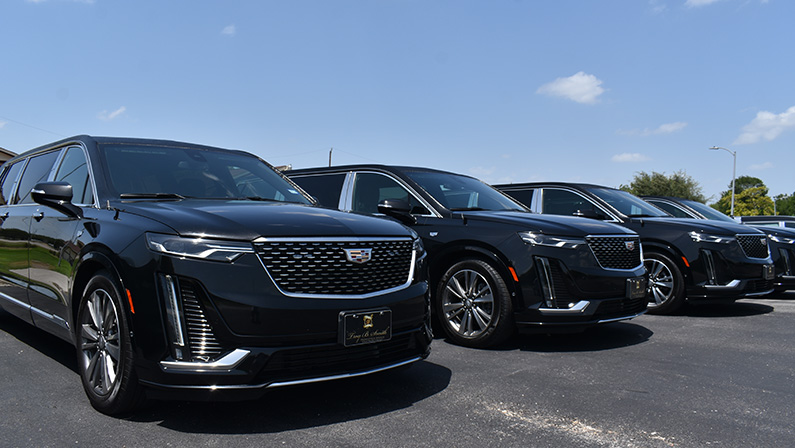 Houston, TX USA 7-15-2023 - A portrait of a fleet of customized stretch limousines at Troy B. Smith's Professional Services funeral home in Houston.